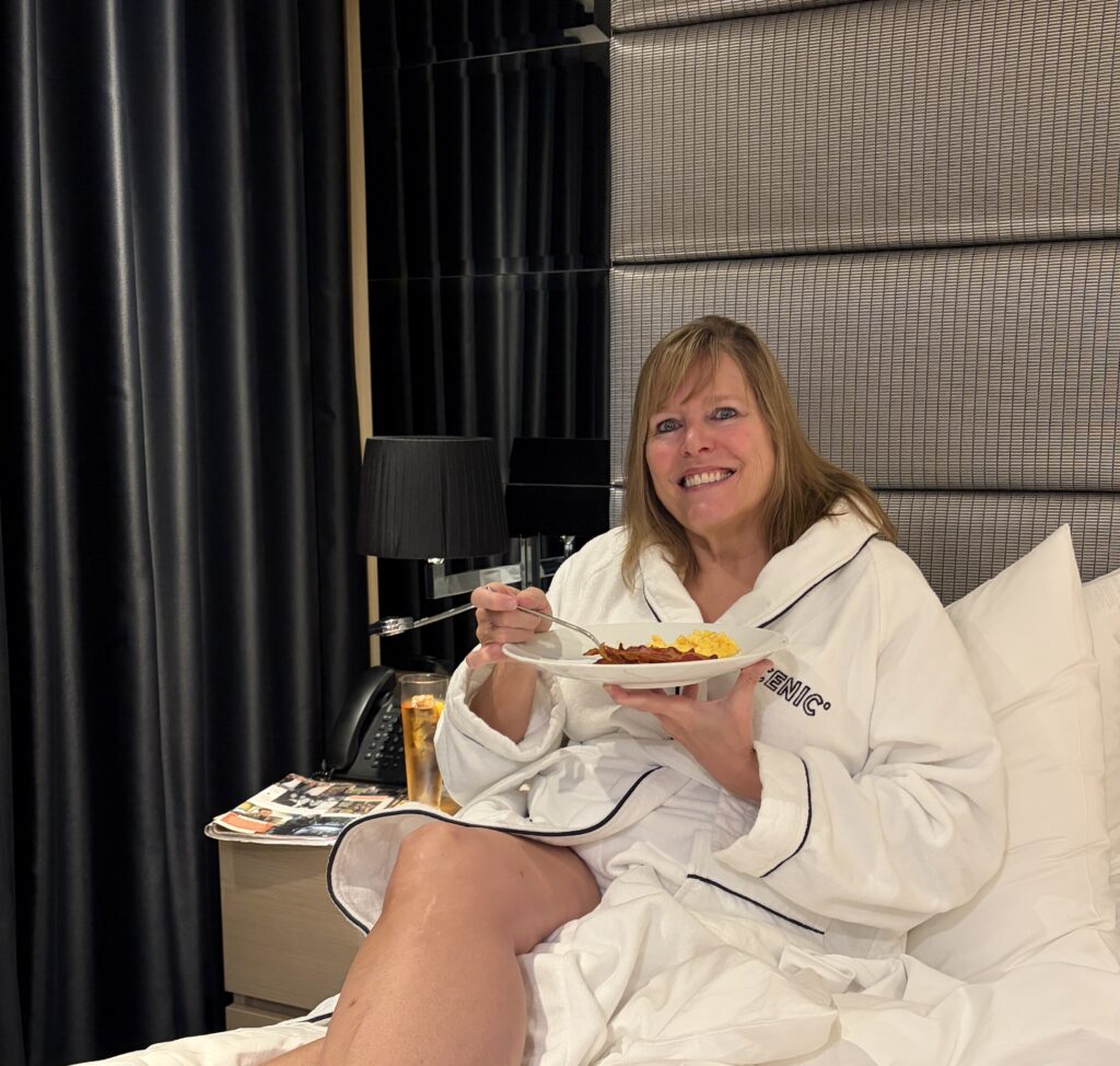 Enjoying breakfast room service in a robe on a European river cruise.